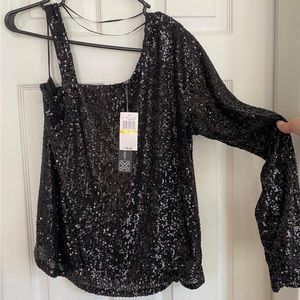 Sequin blouse. Perfect for the holidays or date night!